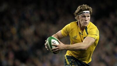 Michael Hooper on his way to scoring a try on Saturday night. Peter Morrison / AP