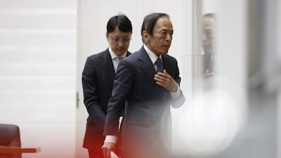 Kazuo Ueda, governor of the Bank of Japan leaves a news conference at the central bank's headquarters in Tokyo, on Friday. The Bank of Japan continued to defy global central bank trends by sticking with stimulus as it waits for signs of more sustainable inflation while its peers signal the need to raise interest rates further to rein in prices. Bloomberg