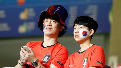 Fans at Kyrgyzstan v South Korea at the Hazza Bin Zayed Stadium, Al Ain. Reuters