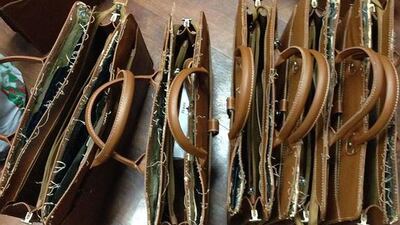 Dubai CUstoms officers found 3.6 kilograms of opium stuffed in 40 handbags at Dubai International Airport. Photo Courtesy- Dubai Customs