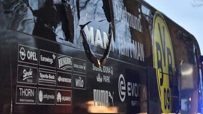 A window of Dortmund’s team bus is damaged after an explosion before the Champions League quarter-final football match between Borussia Dortmund and AS Monaco in Dortmund, western Germany, on Tuesday, April 11, 2017. Martin Meissner / AP Photo