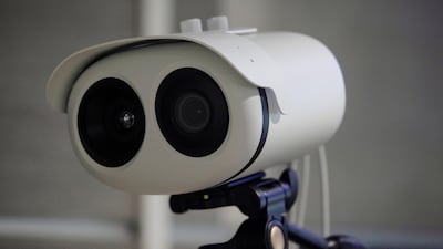 A thermal imaging system is seen inside an airport in Santiago. Courtesy Reuters