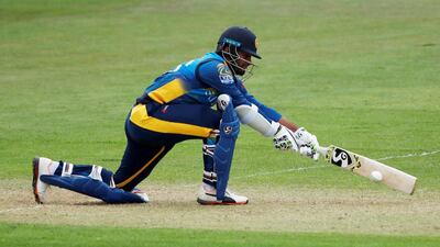 Dimuth Karunaratne will lead Sri Lanka into battle as they take on New Zealand in Cardiff today. Andrew Boyers / Reuters