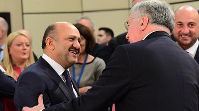 Turkey's defence minister Fikri Isik, left, meeting the United Kingdom's defence minister Michael Fallon during a Nato defence ministers in Brussels on February 15, 2017. Mr Isik said on February 22, 2017 that half the town of Al Bab was in the hands of Turkish troops and allied pro-Ankara Syrian rebels, after the government repeatedly said it was 'largely under control'. Emmanuel Dunand/AFP Photo