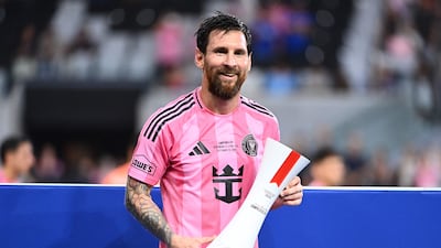 Inter Miami star Lionel Messi celebrates with the Player of the Match award after the Campeones Cup 2026 final win over Cruz Azul at Nu Stadium in Miami, Florida. AFP