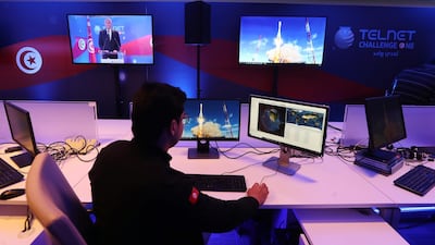 An employee of Tunisia's Telnet telecommunications group during the launch of Tunisia's first satellite ''Challenge-1''. EPA