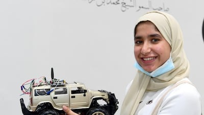 Mariam with one of her many inventions designed to boost safety and improve lives. Photo: Mariam Alghafri