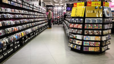 A man browses CDs inside the original branch of the HMV chain of music retailers in London, England. Getty Images