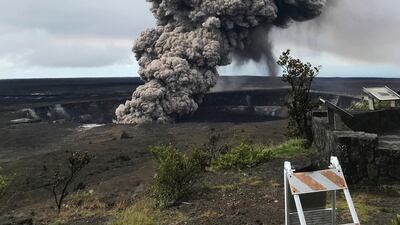 An ash column rises from the crater at the summit of Kilauea volcano. US Geological Survey via AP