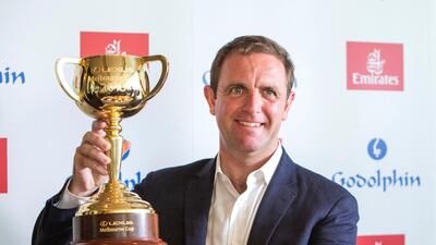 Goldolphin trainer Charlie Appleby with the Melbourne Cup during a press conference in Dubai. Leslie Pableo for The National