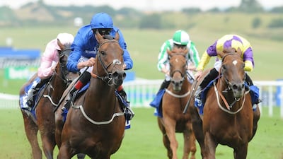 Harry Angel ridden by Adam Kirby, left, wins the July Cup at Newmarket Racecourse. Rui Vieira / Press Association