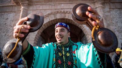 A Gnawa traditional group performs in the city of Essaouira to celebrate the decision to add the Gnawa culture to Unesco's list of Intangible Cultural Heritage of Humanity. AFP