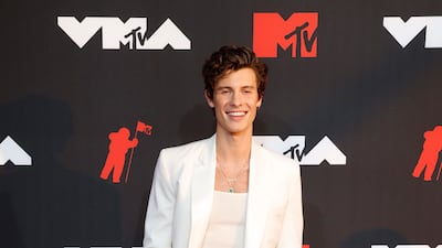 Canadian singer Shawn Mendes, in Mans, arrives on the MTV Video Music Awards red carpet.