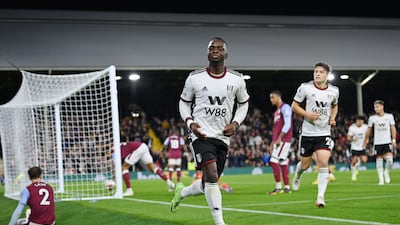 Neeskens Kebano of Fulham celebrates after Tyrone Mings of Aston Villa scored an own goal to make it 3-0 to the home side. Getty Images