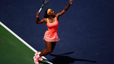 Serena Williams serves against Sloane Stephens on Tuesday during her win to reach the quarter-finals of the WTA Indian Wells tournament. Julian Finney / Getty Images / AFP / March 17, 2015
