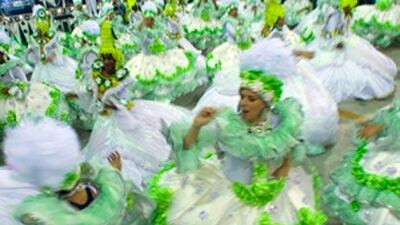 Samba dancers performs during the parade along the Rio de Janeiro Sambodrome on February 23, 2009. A Brazilian-style street festival will transform the Corniche in the weeks leading up to the first Abu Dhabi Grand Prix.