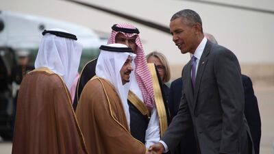 The US president shaking hands with Saudi Arabia’s Prince Faisal bin Bandar bin Abdelaziz al-Saud, governor of Riyadh, upon his arrival. Jim Watson/AFP