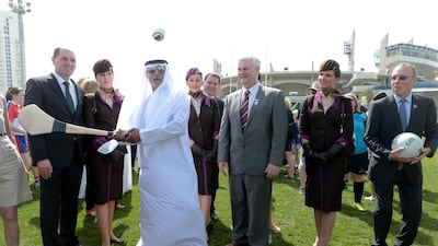 Sheikh Nahyan bin Mubarak Al Nahayan, Minister of Culture, Youth and Community Development tries his hand at hurling, a traditional Irish sport, during the opening ceremony the GAA World Games at Zayed Sports City in Abu Dhabi on March 6, 2015. Christopher Pike / The National