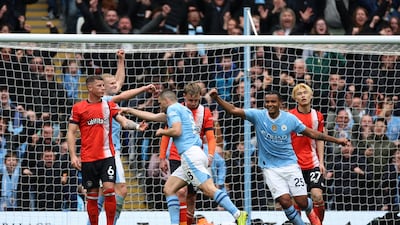 Manchester City's Mateo Kovacic celebrates scoring their second goal with Manuel Akanji. Action Images