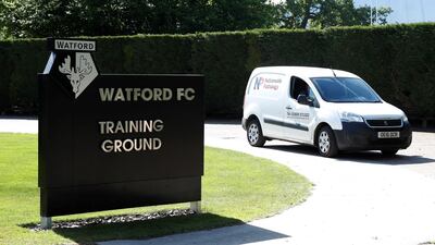 A Nationwide Pathology van leaves Watford Football Club training ground. Reuters