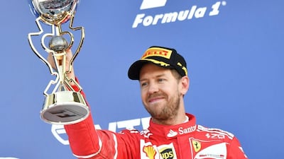 Sebastian Vettel celebrates his second place after the Formula One Russian Grand Prix at the Sochi Autodrom circuit in Sochi on April 30, 2017. Andrej Isakovic / AFP