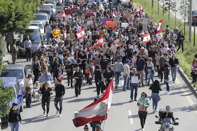 Lebanese demonstrators take part in a march to mark International Women's Day in Beirut on March 8, 2020. AFP