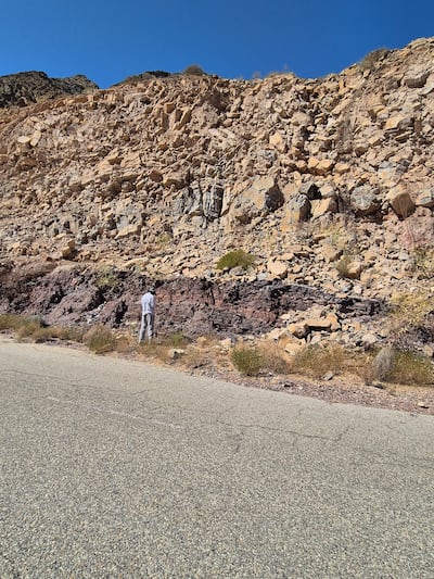 Prof Kosmas Pavlopoulos of the Sorbonne University Abu Dhabi with colleagues analysing rocks and soils in the Hajar Mountains. They are looking for materials suitable to produce simulants, which are materials that mimic those on the surface of the Moon or Mars. Photo: Sorbonne University Abu Dhabi