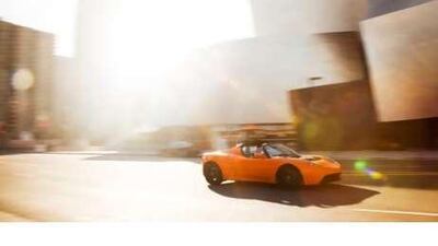 As the sun sets on Detroit, it is rising in California. The state is fast becoming the centre of a new kind of American car industry - electric vehicles, such as this Tesla Roadster.