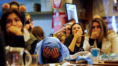 Argentina fans in Buenos Aires react after watching their team lose the 2016 Copa America Centenario final against Chile. Marcos Brindicci / Reuters