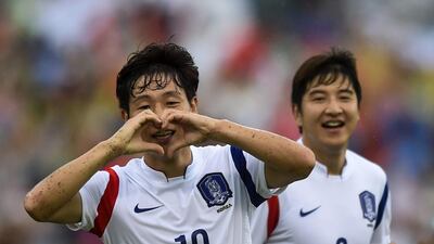 Nam Tae-hee of South Korea celebrates after scoring the lone goal in a 1-0 victory over Kuwait at the Asian Cup on Tuesday that sealed the Koreans' place in the quarter-finals. Lukas Coch / EPA