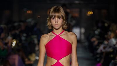 A pink halter cutout dress from the Valentino spring/summer 2022 show