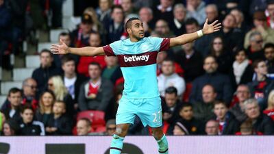 Dimitri Payet of West Ham United celebrates as he scores their first goal from a free kick during the Emirates FA Cup sixth round match between Manchester United and West Ham United at Old Trafford on March 13, 2016 in Manchester, England. (Photo by Clive Brunskill/Getty Images)