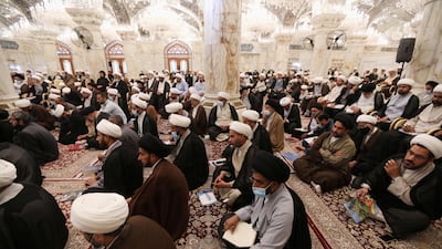 Shiite clerics study inside the shrine of Imam Ali, on the first time of religious school called (al-Hawza al-Ilmiyyah) reopening since the coronavirus disease (COVID-19) outbreak, in the holy city of Najaf, Iraq. Reuters