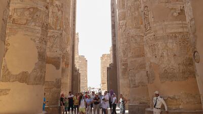 Tourists visit the Karnak Temple, a day after the reopening of the Avenue of Sphinxes, in 2021. AP