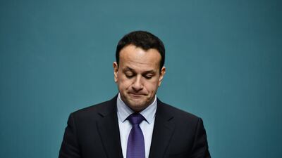 Mr Varadkar looks down during a press conference with EU chief Brexit negotiator Michel Barnier in Dublin in April 2019. Getty Images