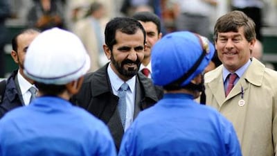 Simon Crisford, right, reiterated yesterday the decision to award rides to jockeys such as Mickael Barzalona, left, and Frankie Dettori, second from right, was Sheikh Mohammed bin Rashid's, centre. Alan Crowhurst / Getty Images