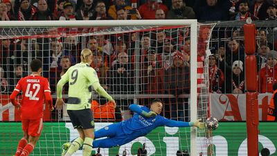 Manchester City goalkeeper Ederson saves a free kick. AFP