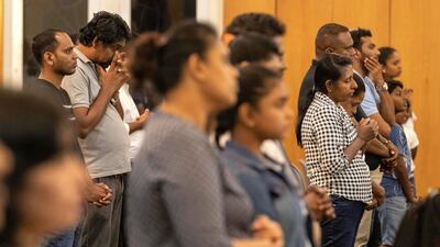 About 100 worshippers prayed for the victims of the Sri Lankan bombings on Monday night. Antonie Robertson / The National