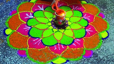 Earthen lamps are lit during Diwali celebrations in Allahabad, India. Sanjay Kanojia / AFP