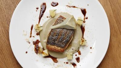 Roasted sea bass with rosemary and artichoke purée by Christopher Driver, the chef de cuisine at Jumeirah Beach Hotel’s Dhow and Anchor.