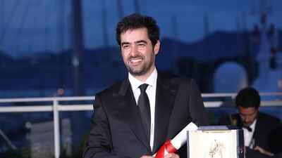 Iranian actor Shahab Hosseini poses with the award for Best Actor for the movie The Salesman. Andreas Rentz / Getty Images