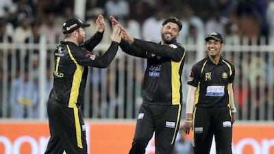 Mohammed Naveed of Kerala Knights celebrates his run out of Pakhtoons' Chadwick Walton in the T10 League at Sharjah Cricket Stadium on Wednesday.