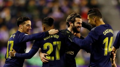 Real Madrid's Nacho celebrates scoring their first goal with teammates. Reuters