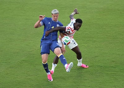 Folarin Balogun fouls Tarik Muharemovic of Bosnia and Herzegovina. Getty Images via AFP
