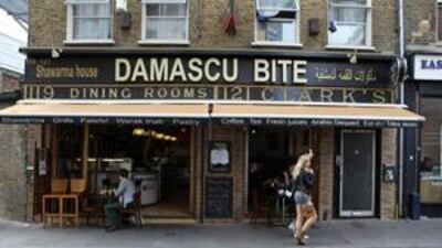 The Syrian restaurant Damascu Bite serves Middle Eastern dishes including shawarma and falafel in Brick Lane, East London, a neighbourhood known for its Bangladeshi curry houses.