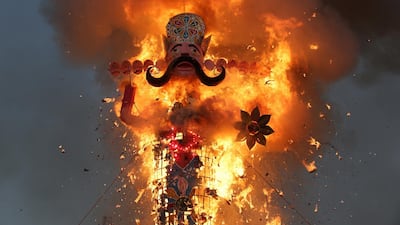 An effigy of demon king Ravana burns during the Dussehra festival celebrations in Jammu, the winter capital of Kashmir, India. EPA