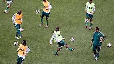 South Africa players work on their ball control during their final training session before today's World Cup opener against Mexico in Soccer City in Johannesburg.
