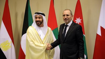 Sheikh Abdullah bin Zayed shakes hands with Jordanian Foreign Minister Ayman Safadi ahead of informal talks at the King Hussein Convention Centre at the Dead Sea. Reuters