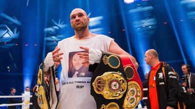 British fighter Tyson Fury celebrates in the ring after his victory over Ukraine's Vladimir Klitschko after their world heavyweight title bout at the Esprit Arena in Duesseldorf, Germany, 28 November 2015. EPA/Rolf Vennenbernd