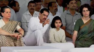 India’s ruling Congress party president Sonia Gandhi, left, her daughter Priyanka Vadra, right, and son-in-law Robert Vadra during a prayer meeting to mark the birth anniversary of former Indian prime minister and Sonia Gandhi's late husband Rajiv Gandhi.